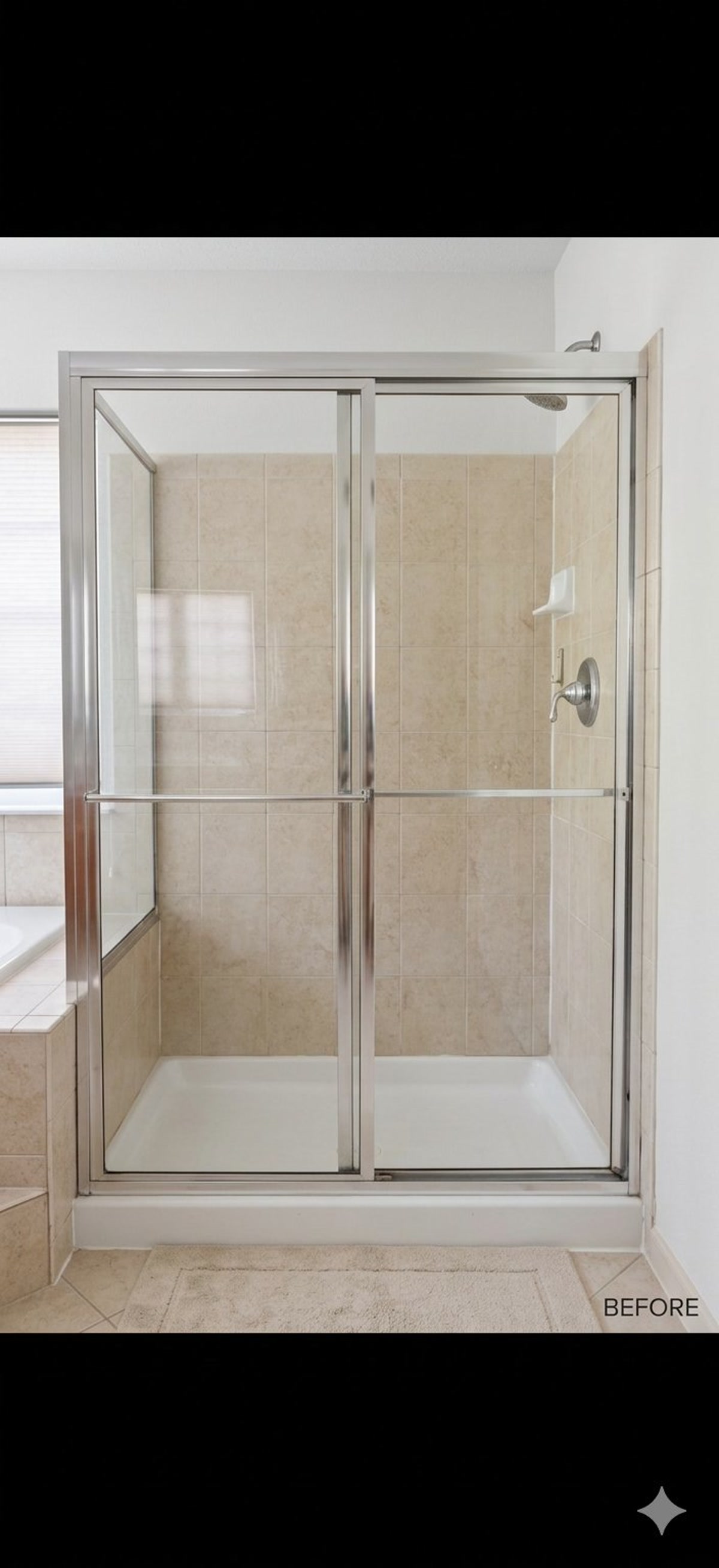 Before, old framed shower enclosure with beige tile